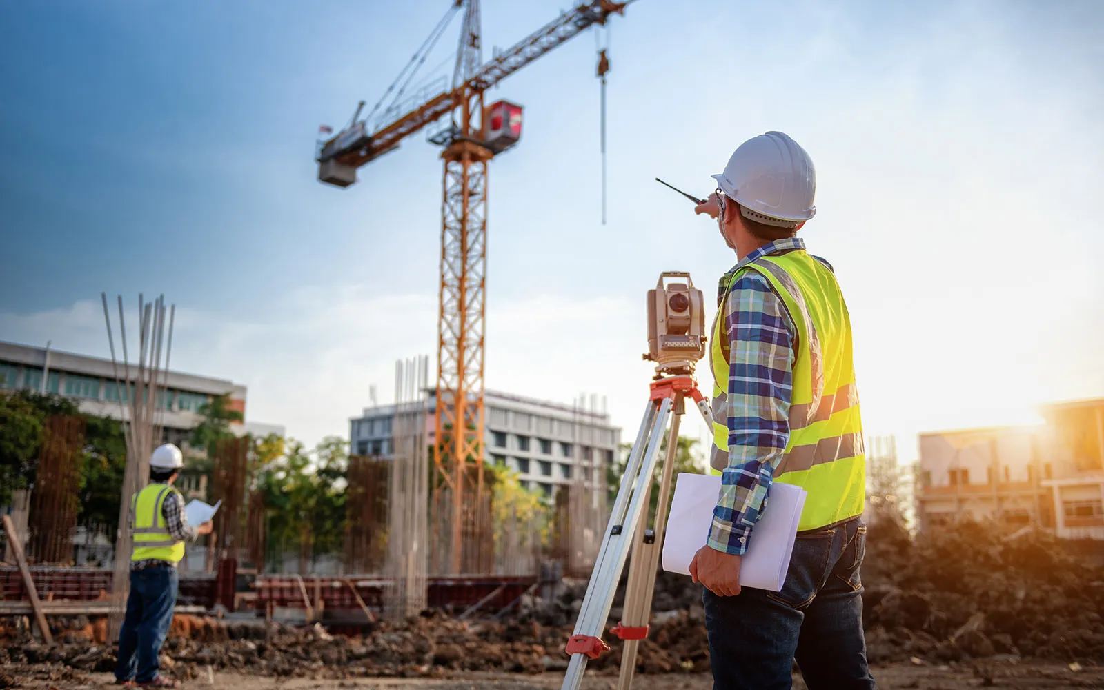 Solagok site supervisor surveying a Calgary job site